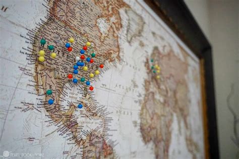 Push pins on a map of the world